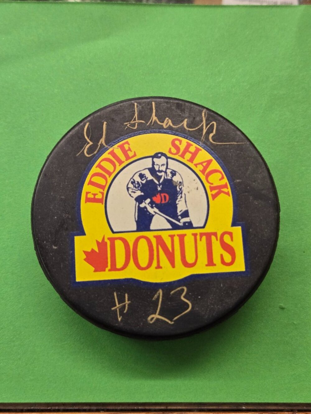 vintage signed Eddie Shack Hockey Puck # 23 Donuts